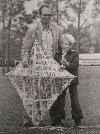 My Son Michael & me with his homade kite and trophy he won in contest.